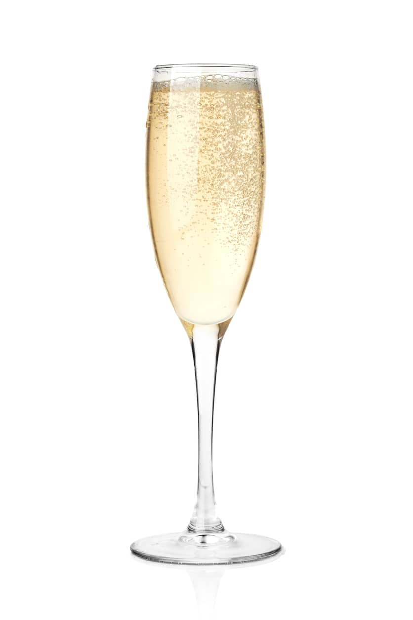 Champagne in a flute with a white background