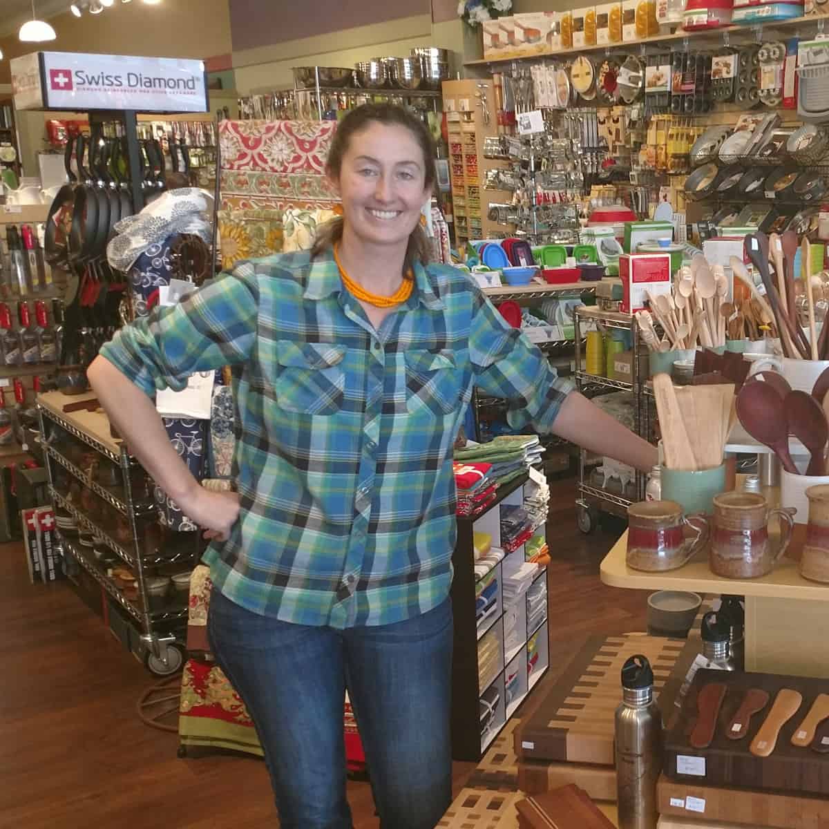 Woman standing in a retail kitchen store